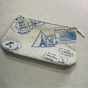 Lancôme Paris canvas cosmetic bag - blue passport stamp design